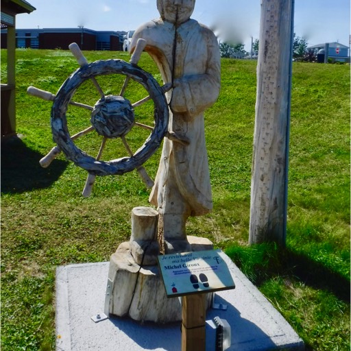 Sculpture of a captain at the wheel of the ship, navigating his way home to his beloved. 